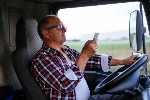 distracted truck driver on phone
